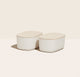 Open Spaces - Two small storage bins, with wooden lids, placed side by side in Cream.