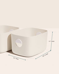 The Open Spaces Medium Storage Bins with dimensions on a cream background. 