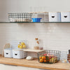 Kitchen tool, baskets and fruit in a light modern space