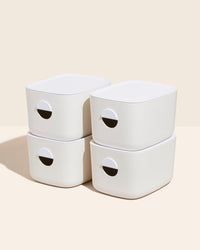 Medium Bin Bundle in Cream with White Lids on a pink background. 