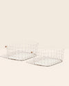 The Opens Spaces Large Cream Wire Baskets on a cream background. 