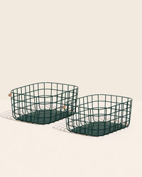 The Open Spaces Large Baskets - Set of 2 in Dark Green on a cream background.