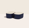 Open Spaces - Two small storage bins, with wooden lids, placed side by side in Navy